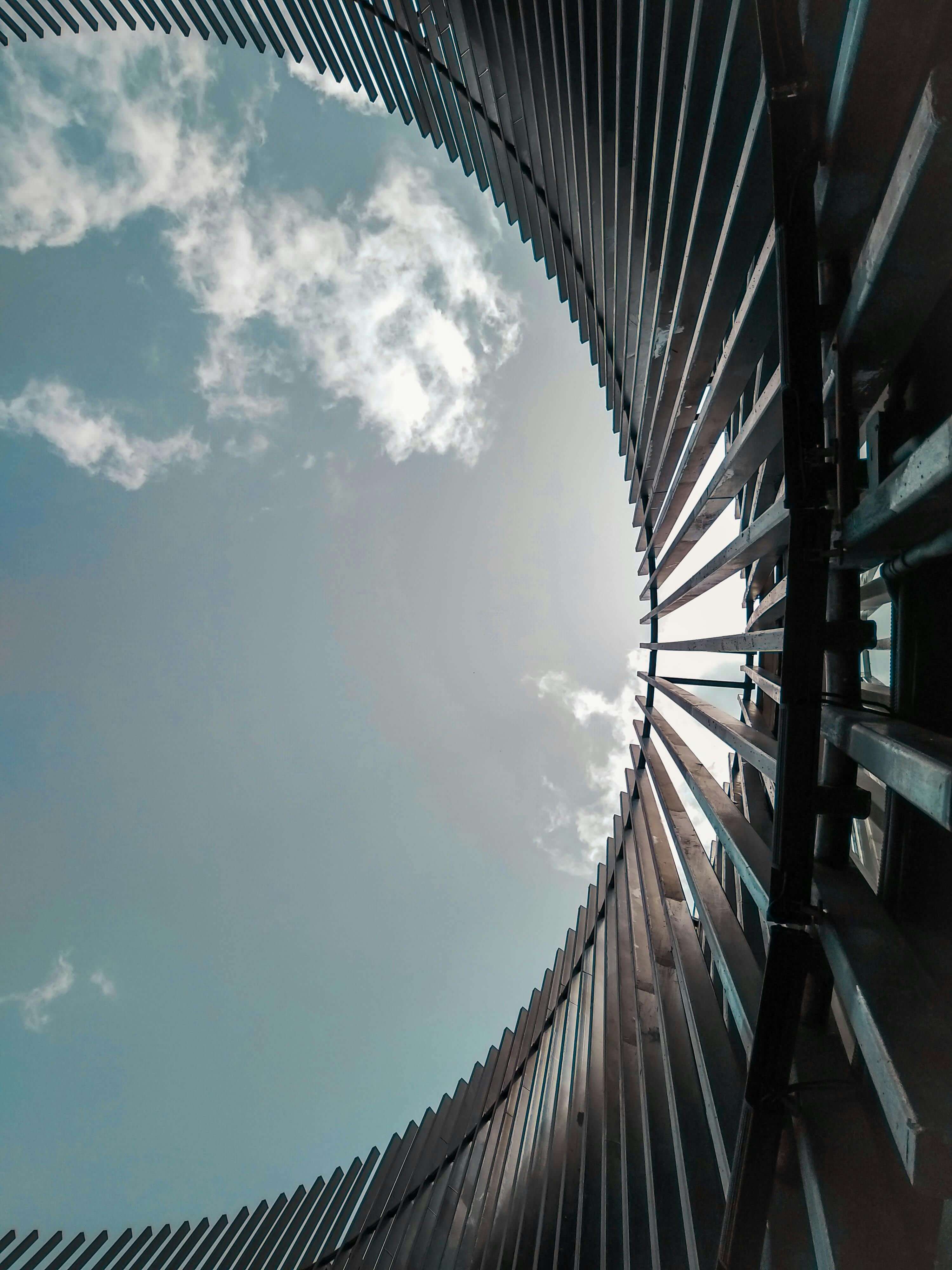 Solar panel construction crane against sunset sky